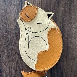 Rolf’s “vintage” leather kitty coin purse